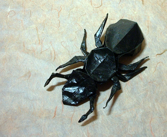 Origami Ant by Robert J. Lang. Folded from a painted square of thin brown wrapping paper by Gilad Aharoni on giladorigami.com