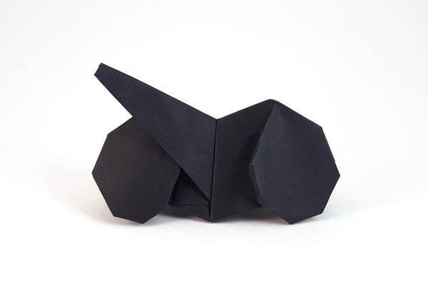 Origami Batcycle by John Montroll. Folded from a square of Tant paper by Gilad Aharoni on giladorigami.com