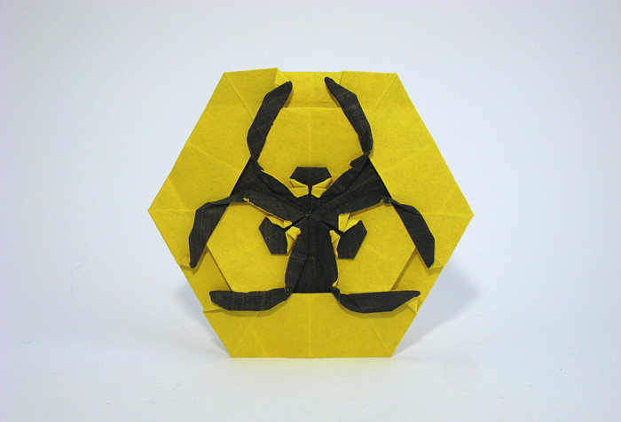 Origami Biohazard symbol by Morisue Kei. Folded from a triangle of Tant paper by Gilad Aharoni on giladorigami.com