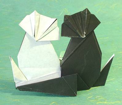 Origami Cats - togetherness by Fred Rohm. Folded from a square of origami paper by Gilad Aharoni on giladorigami.com