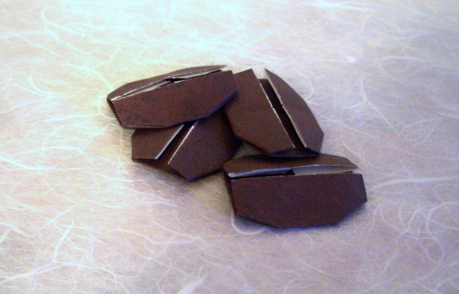 Origami Coffee bean by Toshikazu Kawasaki. Folded from a rectangle of origami paper by Gilad Aharoni on giladorigami.com
