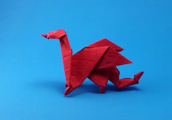 Origami Dragon by Edwin Corrie. Folded from a square of textured paper by Gilad Aharoni on giladorigami.com
