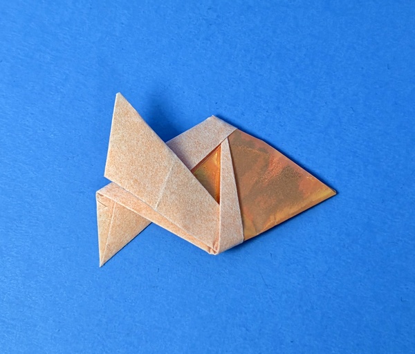 Origami Fish by Steven Casey. Folded from a rectangle of holographic origami paper by Gilad Aharoni on giladorigami.com
