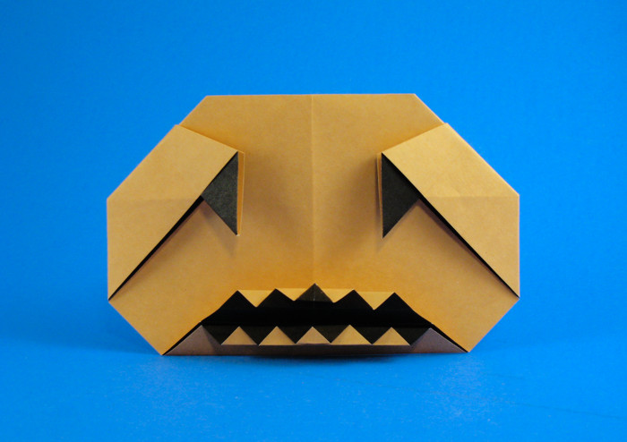 Origami Jack-o'-lantern by Joseph Wu. Folded from a square of duo origami paper by Gilad Aharoni on giladorigami.com