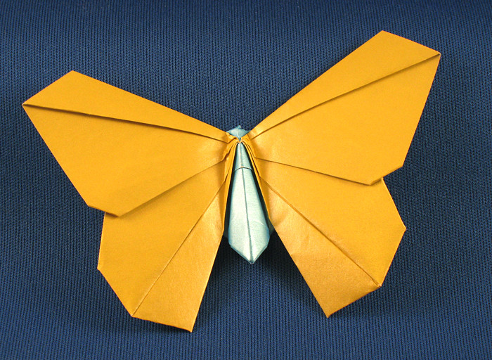 Origami Butterfly by Michael G. LaFosse. Folded from a square of duo-pearl origami paper by Gilad Aharoni on giladorigami.com
