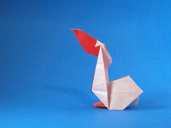 Origami Pelican by Juan Francisco Carrillo (Juanfran). Folded from a square of origami paper by Gilad Aharoni on giladorigami.com
