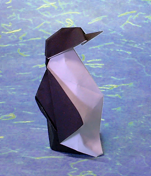 Origami Penguin by Eduardo Clemente. Folded from a square of origami paper by Gilad Aharoni on giladorigami.com