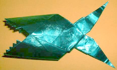 Origami Piranha by Olivier Viet. Folded from a square of patterned foil by Gilad Aharoni on giladorigami.com
