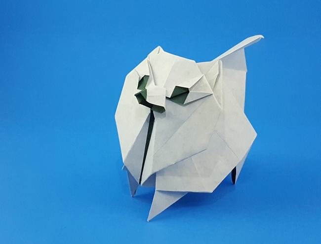 Origami Pomeranian by Meng Weining (212moving). Folded from a square of origami paper by Gilad Aharoni on giladorigami.com