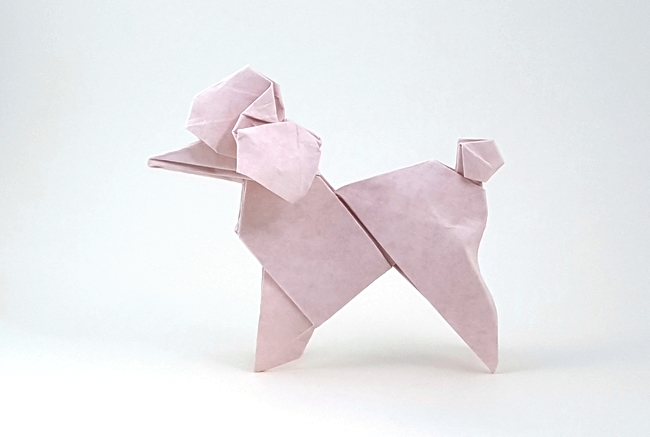 Origami Poodle by Roman Diaz. Folded from a square of Astroparche crepe embossed cardstock by Gilad Aharoni on giladorigami.com