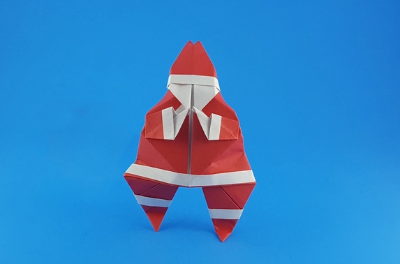 Origami Santa Claus by Francesco Miglionico. Folded from a square of origami paper by Gilad Aharoni on giladorigami.com