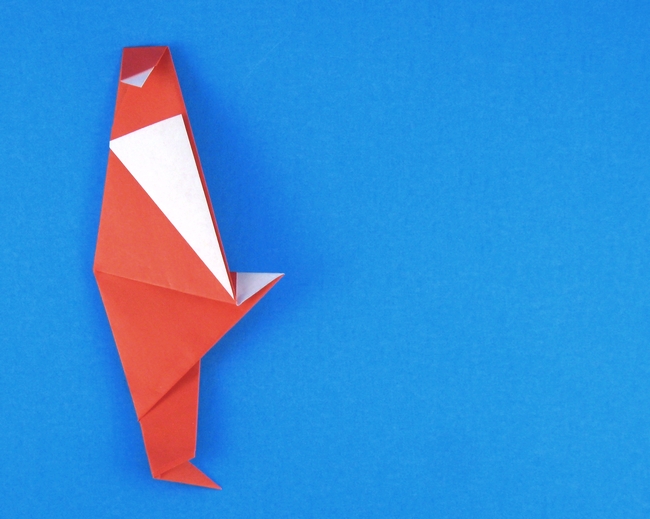 Origami Santa Claus by Francesco Miglionico. Folded from a rectangle of origami paper by Gilad Aharoni on giladorigami.com