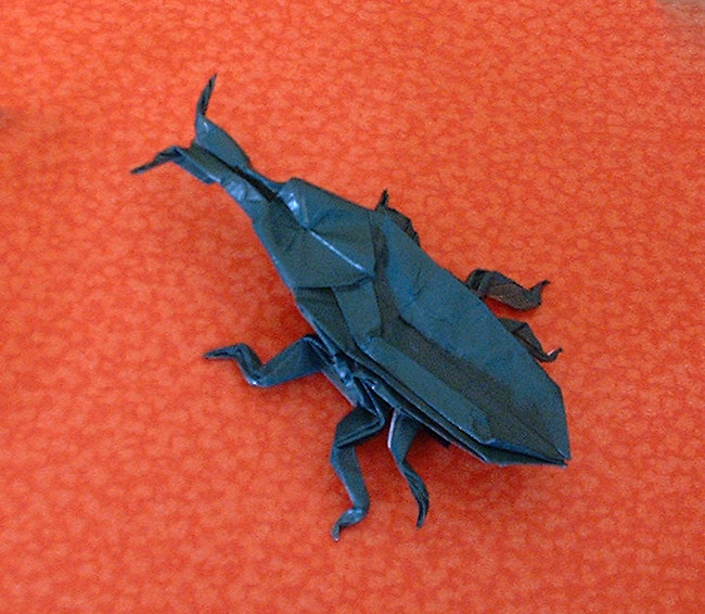 Origami Long necked seed bug by Robert J. Lang. Folded from a square of origami paper by Gilad Aharoni on giladorigami.com