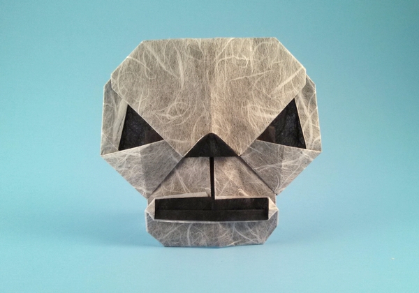 Origami Skull by Wayne Brown. Folded from a rectangle of duouble-sided Unryu by Gilad Aharoni on giladorigami.com