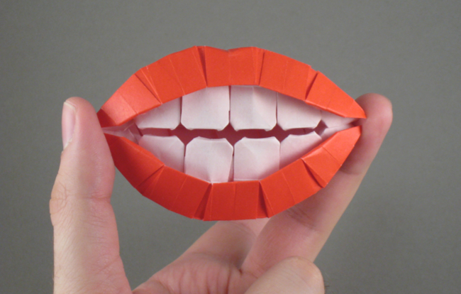 Origami Smile! by Masaya Horiguchi. Folded from a square of origami paper by Gilad Aharoni on giladorigami.com
