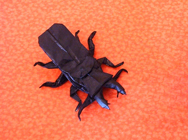 Origami Stag beetle by Robert J. Lang. Folded from a square of origami paper by Gilad Aharoni on giladorigami.com