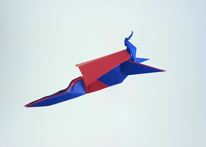 Origami Superman by Juan Francisco Carrillo (Juanfran). Folded from a square of Duo origami paper by Gilad Aharoni on giladorigami.com