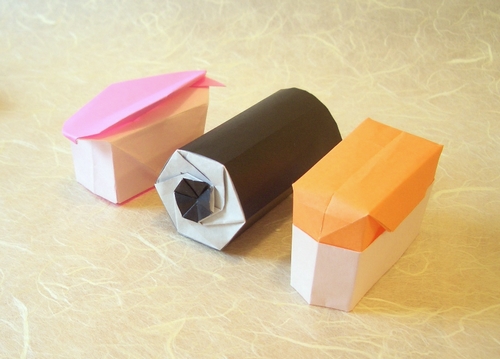 Origami Sushi roll by Makoto Yamaguchi. Each folded from a square of origami paper by Gilad Aharoni on giladorigami.com