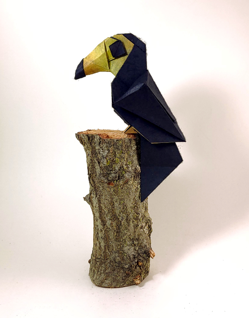Origami Toucan by Jiahui Li (Syn). Folded from a square of Shadow Thai origami paper by Gilad Aharoni on giladorigami.com