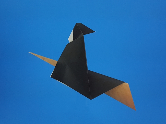 Origami Witch by Kunihiko Kasahara. Folded from 2 squares of origami paper by Gilad Aharoni on giladorigami.com